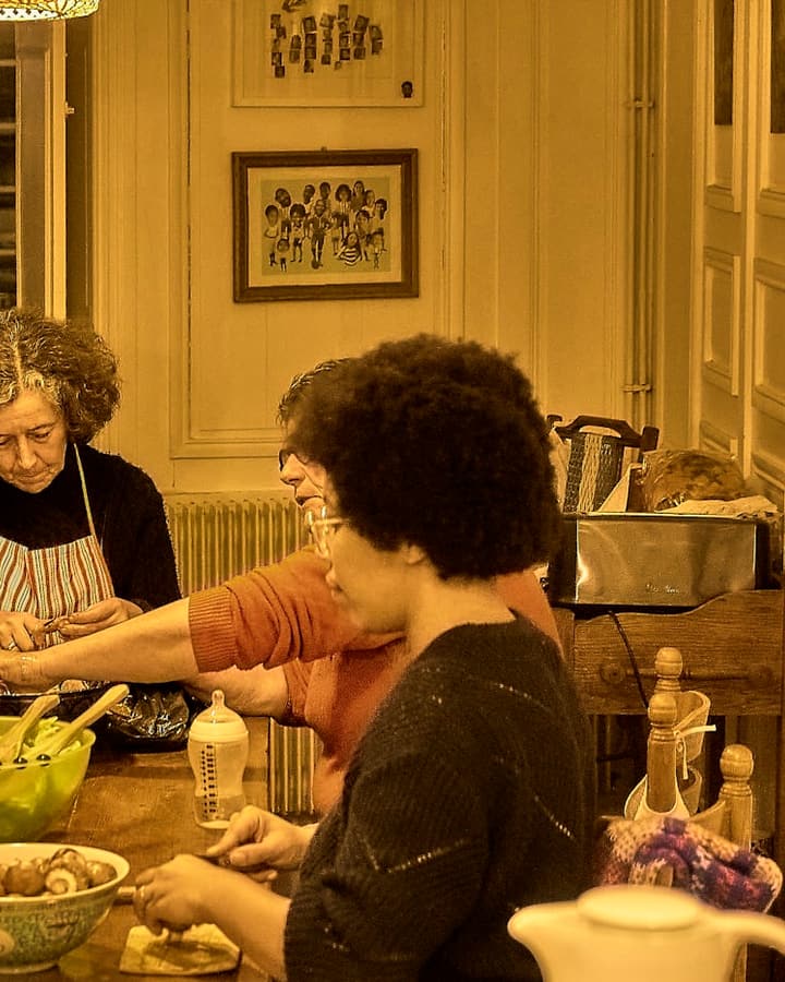 A household gathered around a table